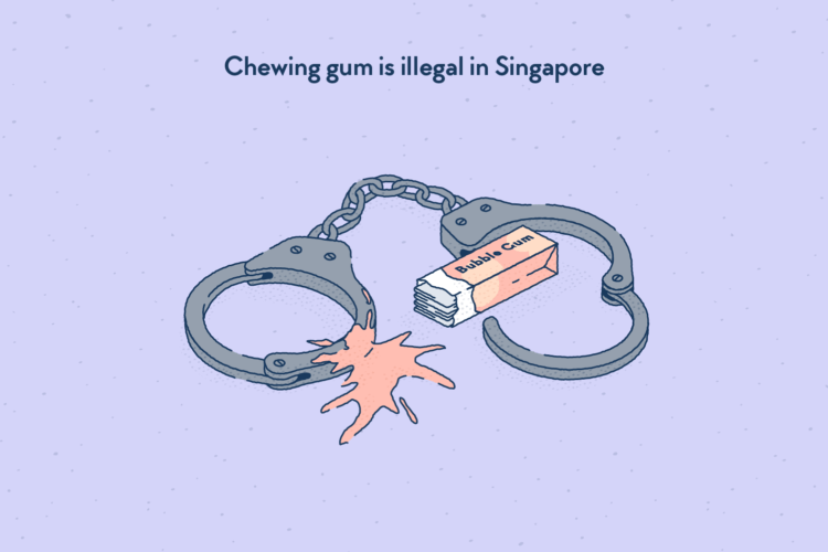 A pack of chewing gum and a crushed gum in the middle of police handcuffs.